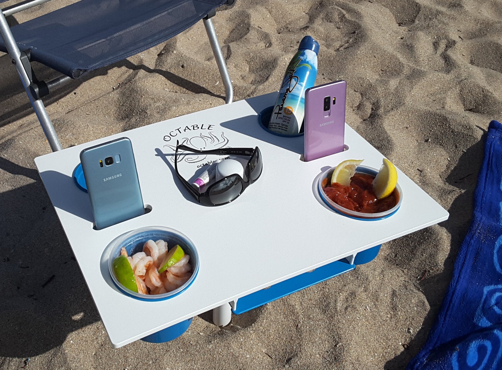 Octable Beach Table octopus octables sand cell phones, red cups,